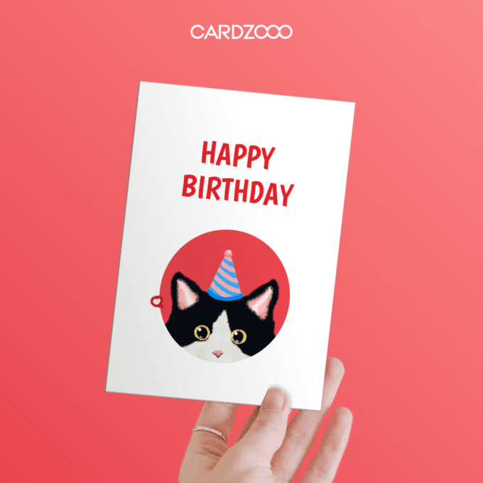 Celebrate a special day with this charming minimalist Cat-Themed Birthday Card! 🐾 Featuring an adorable black-and-white cat wearing a playful party hat inside a vibrant red circle, this simple yet delightful design is perfect for any cat lover. The bold "Happy Birthday" text adds a cheerful touch, making it ideal for sharing warm wishes with friends and family.