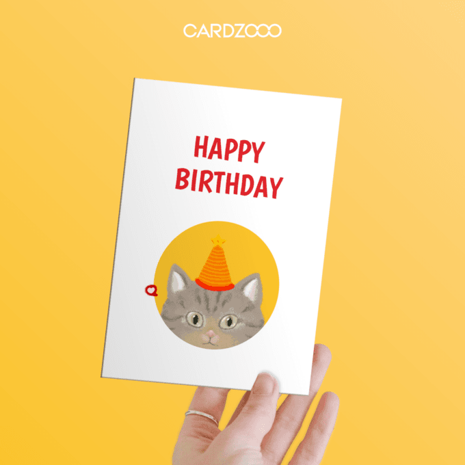 Celebrate in style with this adorable Cat-Themed Birthday Card! 🐾🎉 Featuring a sweet gray tabby cat wearing a festive orange-striped party hat, set against a sunny yellow background, this card radiates warmth and joy. The bold "Happy Birthday" text adds a celebratory touch, making it a perfect choice for cat lovers and birthday celebrations.